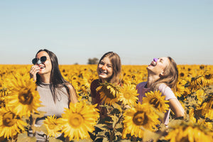 Group of friends wearing environmentally safe Noz Sunscreen while enjoying nature.